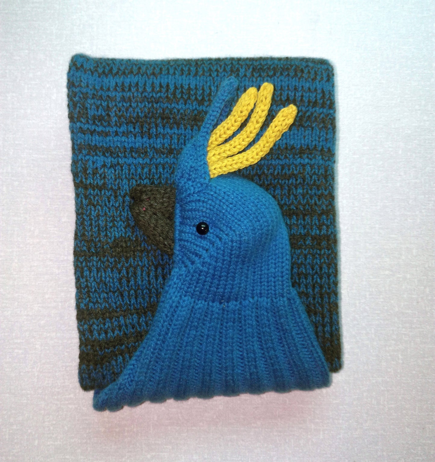 Cockatoo Stole in turqoise blue with yellow from lambswool, bird scarf knitted by Nina Fuhrer